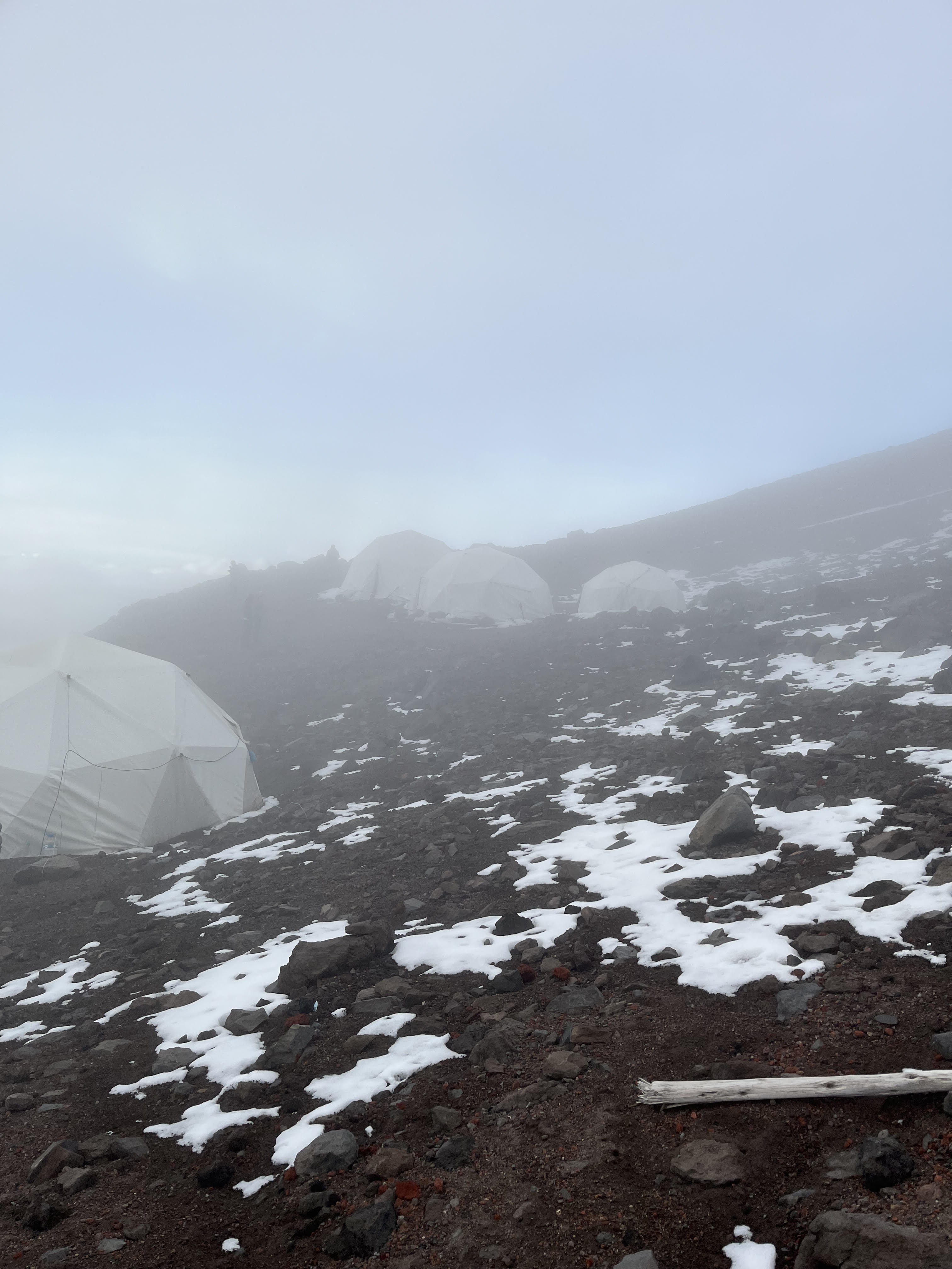When we arrived at the high camp, it was covered in fog.